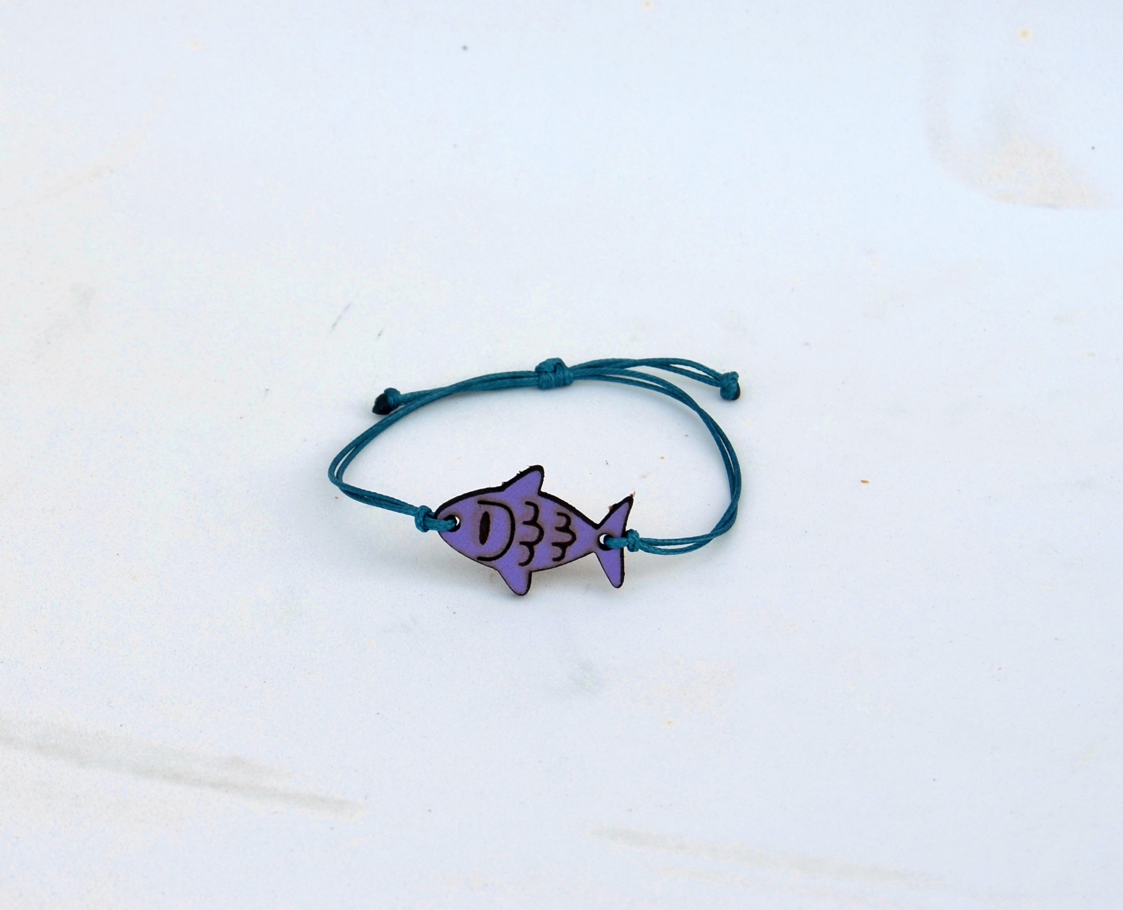 Peixe pulsera lila JPG